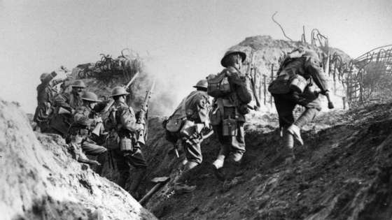 circa 1914:  British soldiers in the trenches during World War I.   Original Publication: From 'Official Series The Great War' - 'With dogged courage we overcome stiff resistance and break the Hun lines from Epehy to Bellicourt'.  (Photo by Hulton Archive/Getty Images)