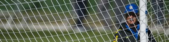 Brazilian national football team coach Luiz Felipe Scolari adjusts the goal on the field during in a training session of the Brazilian national football team at the squad's Granja Comary training complex, in Teresopolis, 90 km from downtown Rio de Janeiro, on June 5, 2014, ahead of the FIFA World Cup Brazil 2014 tournament. AFP PHOTO/VANDERLEI ALMEIDA        (Photo credit should read VANDERLEI ALMEIDA/AFP/Getty Images)