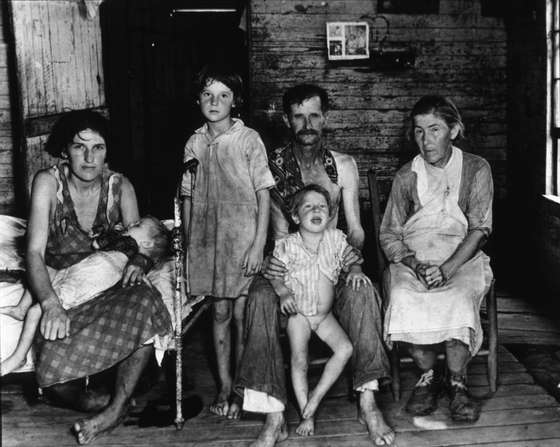 Cotton Sharecropper Bud Fields and his family at their home in Hale County, Alabama.   (Photo by Walker Evans/Getty Images)