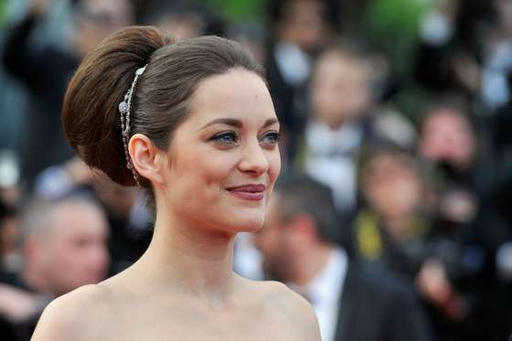 attend the "De Rouille et D'os" Premiere during the 65th Annual Cannes Film Festival at Palais des Festivals on May 17, 2012 in Cannes, France.