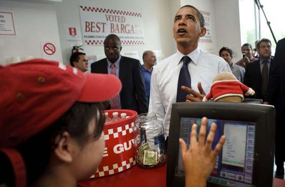 WASHINGTON - MAY 29:  US President Barack Obama at a Five Guys restaurant May 29, 2009 in Washington, DC.  President Obama traveled with his motorcade to the burger restaurant in Southeast Washington.  (Photo by Brendan Smialowski/Getty Images)