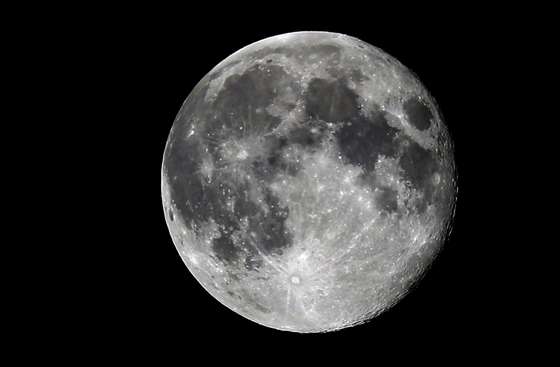 Photo of the full moon, on August 21, 2013 in Nice, southeastern France.  AFP PHOTO / VALERY HACHE        (Photo credit should read VALERY HACHE/AFP/Getty Images)