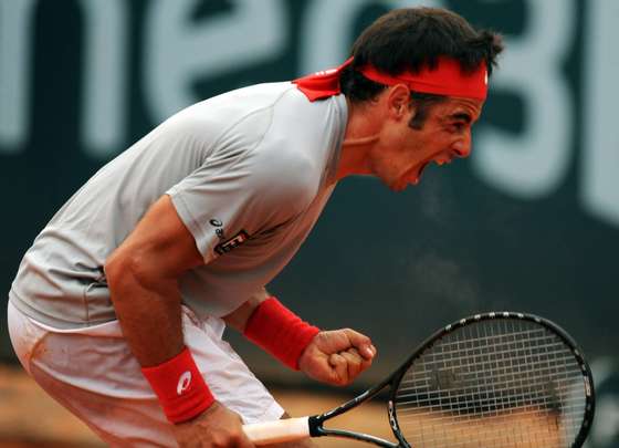 Frederico Gil of Portugal celebrates his victory over Guillermo Garcia-Lopez of Spain during their semifinal Estoril Open tennis match at Jamor Stadium, outkirts of Lisbon, on May 8, 2010. Gil won 6-2, 5-7, 6-3. AFP PHOTO/  FRANCISCO LEONG (Photo credit should read FRANCISCO LEONG/AFP/Getty Images)