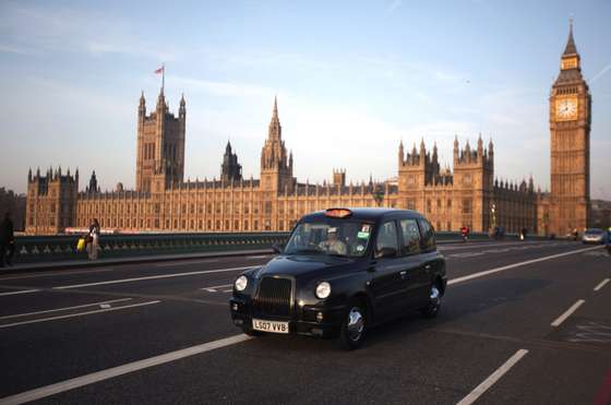 LONDON, ENGLAND - MARCH 28: A black taxi cab makes its way over Westminster Bridge on March 28, 2012 in London, England. (Photo by Dan Kitwood/Getty Images)
