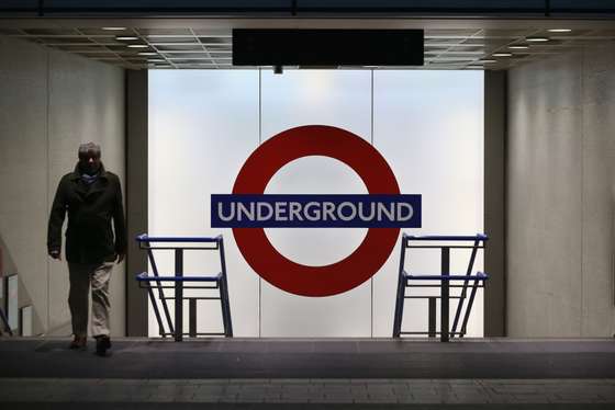 LONDON, UNITED KINGDOM - DECEMBER 23: Members of the public use the London Underground in Kings Cross Station on December 23, 2013 in London, England. With two days until Christmas day, heavy rain and strong winds are affecting much of southern England with numerous Met office weather warnings in place. Road, rail and ferry routes have been affected by the weather with gusts of wind and flooding anticipated in some areas. (Photo by Oli Scarff/Getty Images)