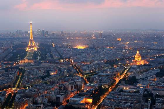 PARIS - JUNE 10: General view of Paris at dusk with the Eiffel Tower and the Hotel des Invalides prominent on June 10, 2008 in Paris, France. (Photo by Mike Hewitt/Getty Images)