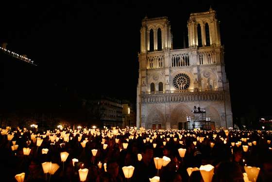 PARIS - SEPTEMBER 12: Atmosphere following the prayer vigil at the cathedral Notre Dame organized in honor of the Pope Benedict XVI visit to France on September 12, 2008 in Paris, France. The four day trip by the Pope to Paris and Lourdes is seen as an attempt to reinvigorate Catholicism in France. (Photo by Julien Hekimian/Getty Images)