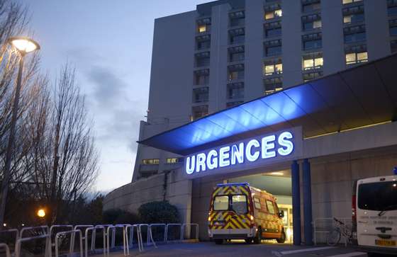 An emergency vehicle enters the emergency department of the Centre Hospitalier Universitaire hospital in Grenoble, on December 30, 2013, where German retired Formula One champion Michael Schumacher is receiving treatment after a skiing accident. The seven-time Formula One champion was in a critical condition on December 30 after suffering severe brain trauma in a skiing accident in the French Alps, doctors said.  AFP PHOTO / Jean-Pierre Clatot        (Photo credit should read PHILIPPE DESMAZES/AFP/Getty Images)