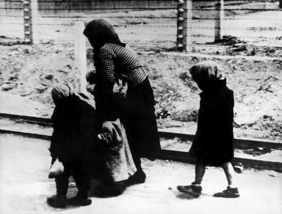 A documental picture showing a selection for gas chambers at the raiway terminal of Auschwitz-Birkenau concentration camp. This picture was taken in May-June 1944 probably by the SS-hauptschafÃ¼rer Walter Kier of the Investigation services. Source : CAF Warsaw. AFP PHOTO (Photo credit should read -/AFP/Getty Images)