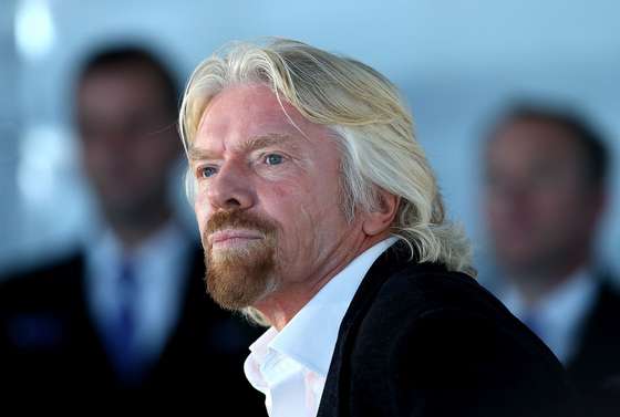 PERTH, AUSTRALIA - MAY 07: Sir Richard Branson looks on during a media conference at Perth Airport on May 7, 2013 in Perth, Australia. Virgin Australia purchased Perth-based regional airline, Skywest adding another 32 planes to it's fleet to expand the airlines regional operations in Australia. (Photo by Paul Kane/Getty Images)