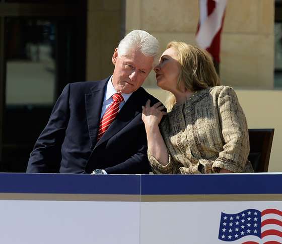 DALLAS, TX - APRIL 25: Former first lady and former Secretary of State Hillary Rodham Clinton speaks with her husband former president Bill Clinton as they attend the opening ceremony of the George W. Bush Presidential Center April 25, 2013 in Dallas, Texas. The Bush library, which is located on the campus of Southern Methodist University, with more than 70 million pages of paper records, 43,000 artifacts, 200 million emails and four million digital photographs, will be opened to the public on May 1, 2013. The library is the 13th presidential library in the National Archives and Records Administration system.  (Photo by Kevork Djansezian/Getty Images)