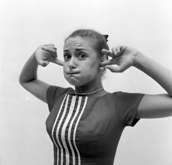 circa 1955:  Holding a mouth full of air and plugging up the ears is another method for stopping an attack of hiccups.  (Photo by Three Lions/Getty Images)