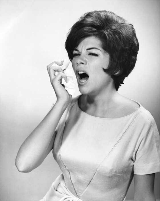 UNITED STATES - CIRCA 1950s:  Woman about to sneeze.  (Photo by George Marks/Retrofile/Getty Images)