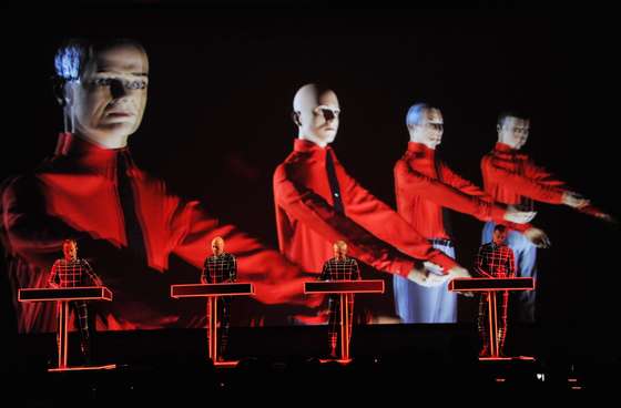 NEW YORK, NY - APRIL 10:  (L-R) Ralf H&Atilde;&frac14;tter, Henning Schmitz, Fritz Hilpert, and Stefan Pfaffe of the band Kraftwerk perform during the Kraftwerk - Retrospective 1 2 3 4 5 6 7 8, Autobahn (1974) at The Museum of Modern Art on April 10, 2012 in New York City.  (Photo by Mike Coppola/Getty Images)