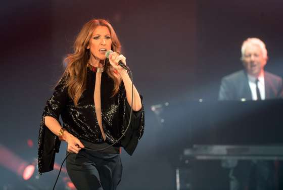 Canadian singer Celine Dion performs during her first of seven shows scheduled until December 5 at the Bercy's Palais Omnisports on November 25, 2013 in Paris. This is Dion's first concert in France since five years after she released her last album "Loved me back to life."  AFP PHOTO / PIERRE ANDRIEU        (Photo credit should read PIERRE ANDRIEU/AFP/Getty Images)