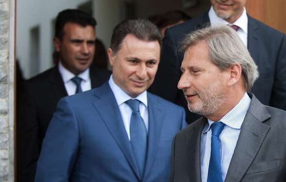 EU Enlargement Commissioner Johannes Hahn ( R), Macedonian Prime Minister Nikola Gruevsk (C) and main opposition leader Zoran Zaev (L)  leave after a meeting at the EU residence building in Skopje on June 2, 2015. Macedonian political leaders agreed to hold elections in early 2016 in order to overcome a deep political crisis, Hahn said. AFP PHOTO / ROBERT ATANASOVSKI        (Photo credit should read ROBERT ATANASOVSKI/AFP/Getty Images)