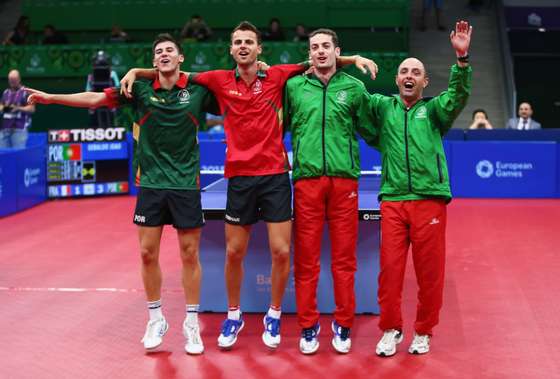 BAKU, AZERBAIJAN - JUNE 15:  Joao Geraldo, Tiago Apolonia, Marcos Freitas and coach of Portugal celebrate winning the gold medal in the Mens Table Tennis Team Final during day three of the Baku 2015 European Games at Baku Sports Hall on June 15, 2015 in Baku, Azerbaijan.  (Photo by Francois Nel/Getty Images for BEGOC)