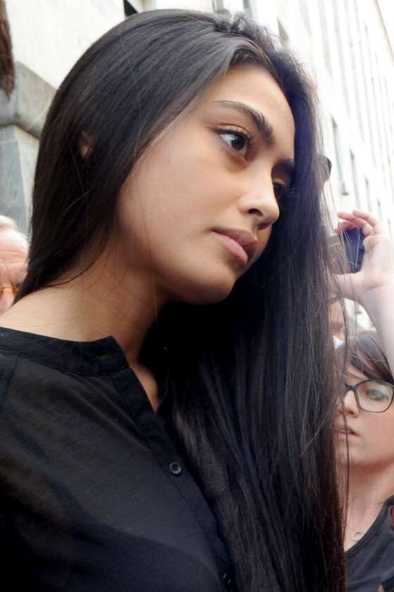 MILAN, ITALY - JULY 19: Ambra Battilana stands at the exit of the courthouse after the verdicts in the 'Ruby bis' case on July 19, 2013 in Milan, Italy. Nicole Minetti, Emilio Fede and Lele Mora were found guilty of aiding and abetting in the procurement of prostititutes for 'bunga bunga' parties held by former Italian prime minister Silvio Berlusconi. (Photo by Pier Marco Tacca/Getty Images)