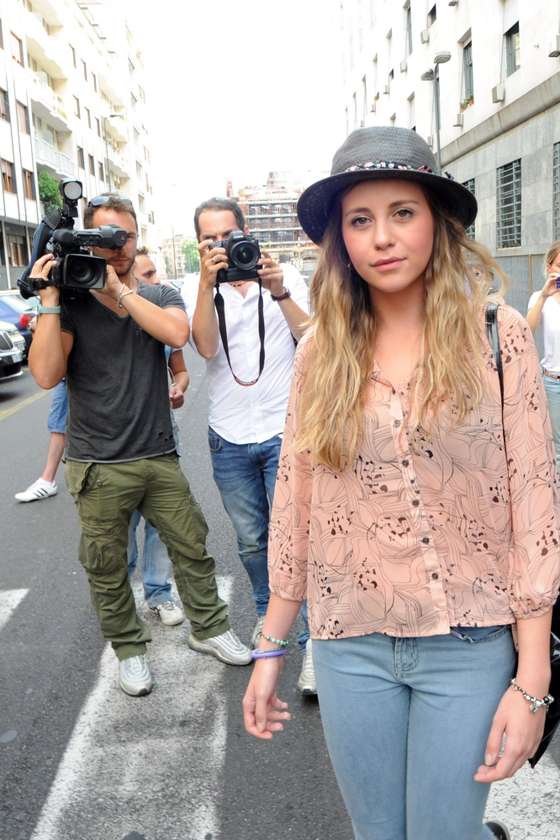 MILAN, ITALY - JULY 19: Chiara Danese leaves the courthouse after the verdicts in the 'Ruby bis' case on July 19, 2013 in Milan, Italy. Nicole Minetti, Emilio Fede and Lele Mora were found guilty of aiding and abetting in the procurement of prostititutes for 'bunga bunga' parties held by former Italian prime minister Silvio Berlusconi. (Photo by Pier Marco Tacca/Getty Images)