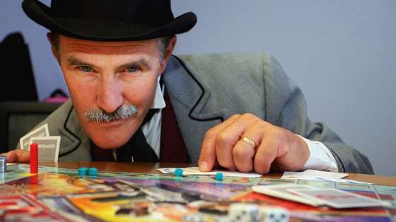 SYDNEY, AUSTRALIA - JUNE 05: Jeremy Johnson from Sovereign Hill Museums plays the new look Australian Here and Now Monopoly board at Hasbro's Head Office on June 5, 2007 in Sydney, Australia. 16.8 million votes determined which 22 regions made it onto the all new Australian Monopoly Here & Now board. (Photo by Lisa Maree Williams/Getty Images)