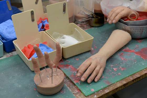 To go with AFP story "Japan-society-crime-yakuza", Feature by Harumi Ozawa In this picture taken on on May 27, 2013, silicone-made fingers and limbs are displayed on a work bench at prosthetics specialist Shintaro Hayashi's office in Tokyo. Going straight after a lifetime spent as a member of Japan's feared yakuza organised crime mobs poses a number of challenges. Chief among them is what to do about the fingers you chopped off. AFP PHOTO / TOSHIFUMI KITAMURA (Photo credit should read TOSHIFUMI KITAMURA/AFP/Getty Images)