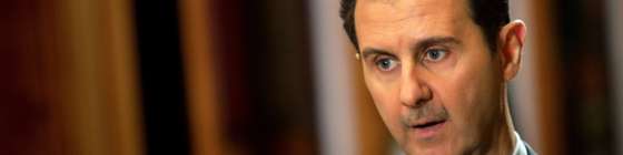 In a picture released on January 20, 2014, Syrian President Bashar al-Assad speaks during an interview with AFP at the presidential palace in Damascus on the weekend. The Syrian president told AFP in an exclusive interview, days before the beginning of the Geneva II peace talks, that he expected his country's bloody conflict to drag on, describing it as a "fight against terrorism" and rejecting any distinction between opposition fighters and radical jihadists. AFP PHOTO/JOSEPH EID -- EDITORS NOTE: The Syrian presidency media office reviewed this series of pictures (Photo credit should read JOSEPH EID/AFP/Getty Images)
