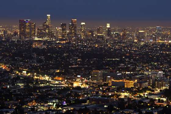 The Los Angeles skyline is seen during twilight on August 21, 2013 in California. AFP PHOTO /JOE KLAMAR (Photo credit should read JOE KLAMAR/AFP/Getty Images)