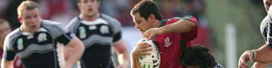 Portugal's fullback Pedro Leal (C) is tackled by Scotland's centre Marcus Di Rollo (R) during the rugby union World Cup match Scotland vs Portugal, 09 September 2007 at the Geoffroy-Guichard stadium in Saint-Etienne, eastern France. AFP PHOTO FRED DUFOUR (Photo credit should read FRED DUFOUR/AFP/Getty Images)