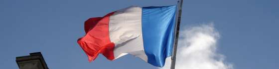 The french flag flies at half mast at the Elysee Palace during a Unity rally Marche Republicaine on January 11, 2015 in Paris in tribute to the 17 victims of a three-day killing spree by homegrown Islamists. The killings began on January 7 with an assault on the Charlie Hebdo satirical magazine in Paris that saw two brothers massacre 12 people including some of the country's best-known cartoonists, the killing of a policewoman and the storming of a Jewish supermarket on the eastern fringes of the capital which killed 4 local residents. AFP PHOTO / DOMINIQUE FAGET (Photo credit should read DOMINIQUE FAGET/AFP/Getty Images)