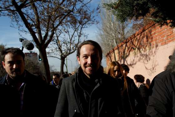 MADRID, SPAIN - DECEMBER 20: Podemos (We Can) leader Pablo Iglesias looks on as he walks after casting his vote at a polling station on December 20, 2015 in Madrid, Spain. Spaniards went to the polls today to vote for 350 members of the parliament and 208 senators. For the first time since 1982, the two traditional Spanish political parties, right-wing Partido Popular (People's Party) and centre-left wing Partido Socialista Obrero Espanol PSOE (Spanish Socialist Workers' Party), held a tight election race with two new contenders, Ciudadanos (Citizens) and Podemos (We Can) attracting right-leaning and left-leaning voters respectively. (Photo by Pablo Blazquez Dominguez/Getty Images)