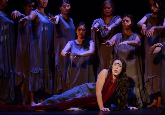 Swedish soprano Paulina Pfeiffer (Front) performs during a full dress rehearsal of the Opera "A Flowering Tree" at the Chatelet theater on May 2, 2014 in Paris. The Opera by composer John Adams and staged by Indian director and screenwriter Vishal Bhardwaj, is inspired by a southern Indian folk tale describing the trials and tribulations of a young couple to demonstrate the power of love. It shows through May 5 - 13, 2014 at the Chatelet theater in Paris. AFP PHOTO / PIERRE ANDRIEU (Photo credit should read PIERRE ANDRIEU/AFP/Getty Images)