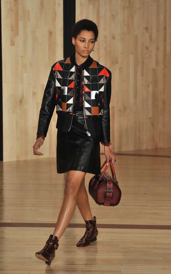 NEW YORK, NY - FEBRUARY 16: A model walks the runway at the Coach fashion show held at Pier 76 during Fall 2016 New York Fashion Week on February 16, 2016 in New York City. (Photo by Fernando Leon/Getty Images)