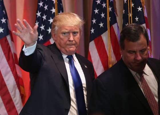 PALM BEACH, FL - MARCH 01: Republican Presidential frontrunner Donald Trump leaves the stage after speaking to the media the Mar-A-Lago Club on March 1, 2016 in Palm Beach, Florida. Trump held the press conference, flanked by New Jersey Governor Chris Christie, on Super Tuesday after the closing of polls in a dozen states nationwide. (Photo by John Moore/Getty Images)