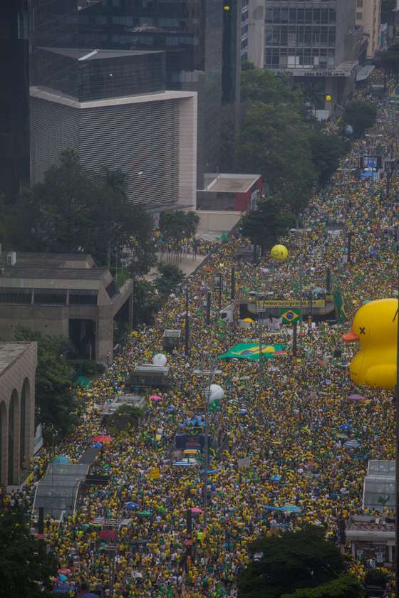 SAO PAULO, BRAZIL - MARCH 13: Protestors demonstrate demanding the removal of President Dilma Rousseff on March 13, 2016 in Sao Paulo, Brazil. Demonstrations across the country today called for President Rousseff's exit amidst a massive corruption scandal and a deep economic recession. (Photo by Victor Moriyama/Getty Images)