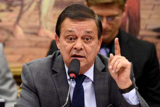 Deputy Jovair Arantes, rapporteur of the lower house special committee on the impeachment of President Dilma Rousseff during a session in Brasilia, on April 11, 2016. Brazil's President Dilma Rousseff risks being driven from office if the lower house votes in favor of an impeachment trial, with Monday's vote in a special commission a symbolic first step. / AFP / EVARISTO SA (Photo credit should read EVARISTO SA/AFP/Getty Images)