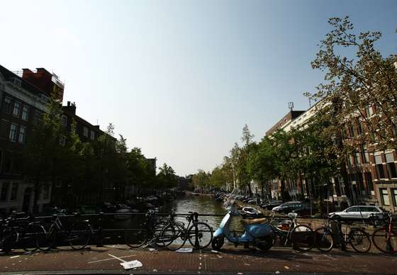 AMSTERDAM, NETHERLANDS - MAY 11: Bikes are chained to a bridge across a canal on May 11, 2009 in Amsterdam, Netherlands. The 750,000 people who live in Amsterdam own over 600,000 bicycles. (Photo by Mark Dadswell/Getty Images)