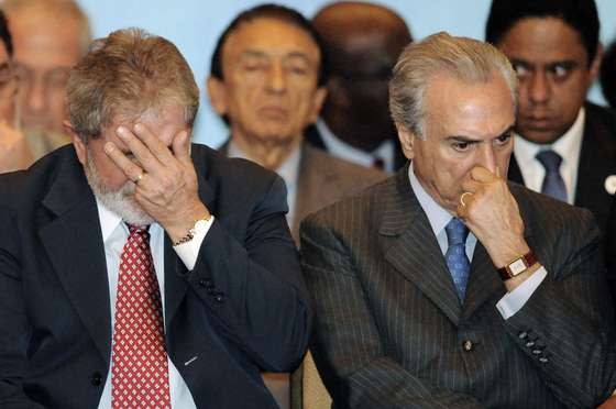 Brazilian President Luiz Inacio Lula da Silva (L) and lower house President Michel Temer attend the launching ceremony of the second-phase of Brazil?s Growth Acceleration Program (PAC2), in Brasilia, on March 29, 2010. The PAC2 foresees private and public investments of USD 529 billion between 2011 and 2014. AFP PHOTO/Evaristo SA (Photo credit should read EVARISTO SA/AFP/Getty Images)