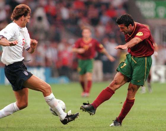 EINDHOVEN, NETHERLANDS - JUNE 12: FUSSBALL: EM EURO 2000, Eindhoven 12.06.00, PORTUGAL - ENGLAND (POR - ENG) 3:2, 1:2 TOR durch Luis FIGO (7) /POR, lks.: Tony ADAMS/ENG (Photo by Sandra Behne/Bongarts/Getty Images)