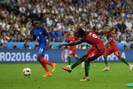 PARIS, FRANCE - JULY 10: Eder of Portugal scores the opening goal during the UEFA EURO 2016 Final match between Portugal and France at Stade de France on July 10, 2016 in Paris, France. (Photo by Matthias Hangst/Getty Images)