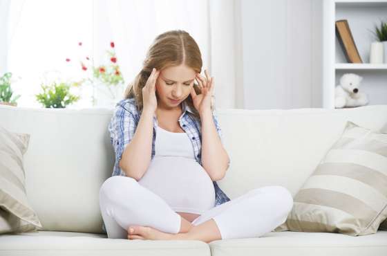 Beautiful, Unwell, Portrait, Girls, Women, Females, Facial Expression, Prenatal Care, Headache, Pain, Young Adult, Adult, Baby, Sitting, Touching, Beauty, Healthy Lifestyle, Caucasian Ethnicity, One Person, Emotional Stress, Anticipation, Care, White, Healthcare And Medicine, Lifestyles, Indoors, Human Head, Human Abdomen, Human Hand, Illness, Human Pregnancy, Tired, Mother, Parent, Family, People, Home Interior, Sofa, 