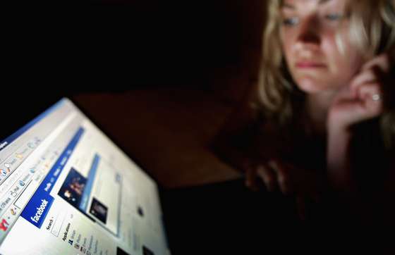 LONDON - JULY 10: In this photo illustration a girl browses the social networking site Facebook on July 10, 2007 in London, England. Facebook has been rapidly catching up on MySpace as the premier social networking website and as of July 2007 was the secondmost visited such site on the World Wide Web. Started by 22 year old Harvard dropout Mark Zuckerberg, the website is responsible for 1% of all internet traffic and is the sixth most visited site in the USA. (Photo Illustration by Chris Jackson/Getty Images)