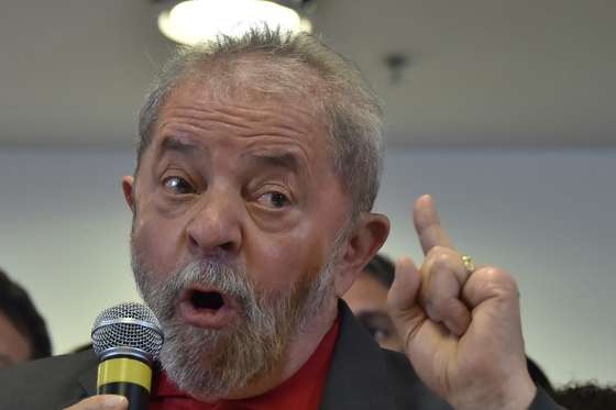 Brazilian former president Luiz Inacio Lula da Silva gestures during a press conference in Sao Paulo, Brazil on September 15, 2016. Lula da Silva defended himself against corruption charges Thursday, saying the case against him was an attempt to destroy him politically ahead of elections in 2018. / AFP / NELSON ALMEIDA (Photo credit should read NELSON ALMEIDA/AFP/Getty Images)