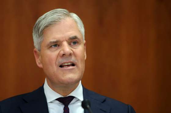 Member of board of the German Federal Bank Bundesbank, Andreas Dombret addresses a press conference following the announcement of the results of the comprehensive assessment (Stresstest) at the Bundesbank in Frankfurt am Main, western Germany, on October 26, 2014. AFP PHOTO /DPA/ FREDRIK VON ERICHSEN GERMANY OUT (Photo credit should read FREDRIK VON ERICHSEN/AFP/Getty Images)