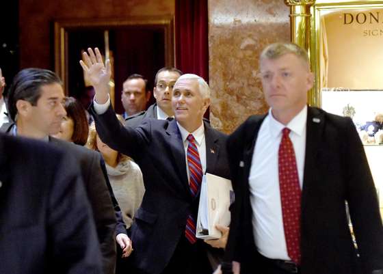 Vice President-elect Mike Pence(C) arrives at Trump Tower for meetings with President-elect Donald Trump November 15, 2016 in New York. Trump,the 70-year-old Republican billionaire who takes office in just nine weeks, was to meet with Vice President-elect Mike Pence to discuss the next round of cabinet appointments. / AFP / TIMOTHY A. CLARY (Photo credit should read TIMOTHY A. CLARY/AFP/Getty Images)