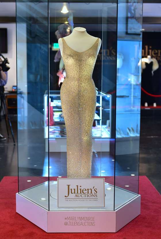 The dress worn by Marilyn Monroe when she sang "Happy Birthday Mr. President" to US President John F. Kennedy in May 1962, is displayed in a glass enclosure at Julien's Auction House in Los Angeles, California on November 17, 2016, ahead of its auction this evening. / AFP / Frederic J. BROWN (Photo credit should read FREDERIC J. BROWN/AFP/Getty Images)