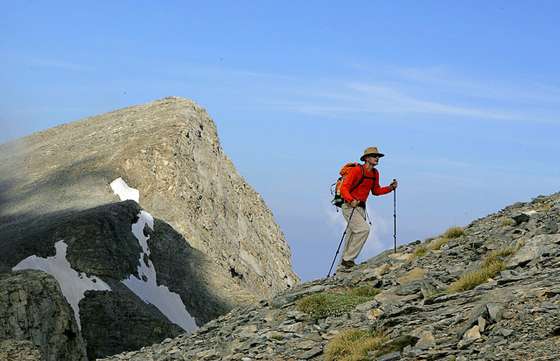 OLYMPUS, GREECE: A hiker climbs Mount Olympus, the legendary home of the ancient Greek gods in central Greece. Seeking to diversify from the country's usual sea and sun recipe, the Greek tourism authorities are trying to develop alternative destinations in less-known, scenic parts of rural Greece. AFP PHOTO/Louisa Gouliamaki (Photo credit should read LOUISA GOULIAMAKI/AFP/Getty Images)