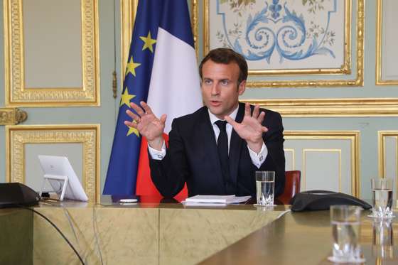 epa08351334 French president Emmanuel Macron takes part in a videoconference with World Health Organization (WHO) general director Tedros Adhanom Ghebreyesus at the Elysee Palace, Paris, France, 08 April 2020. Countries around the world are taking increased measures to stem the widespread of the SARS-CoV-2 coronavirus which causes the Covid-19 disease. EPA/LUDOVIC MARIN / POOL MAXPPP OUT