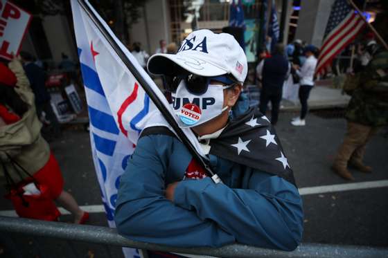 Trump and Biden supporters gathered by the Convention Center in Philadelphia