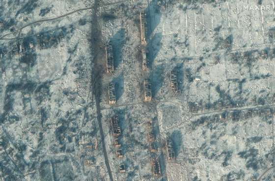 SOLEDAR, UKRAINE -- JANUARY 10, 2022: 02 Maxar satellite (AFTER) imagery of bombed out apartment buildings and homes in Soledar, Ukraine. 10jan2023_ge1. Please use: Satellite image (c) 2022 Maxar Technologies.