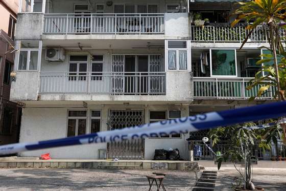 A police cordon restricts access to a village house where the remains of Hong Kong model Abby Choi Tin-fung were found, in Lung Mei Tsuen, Tai Po, Hong Kong China, 26 February 2023. Police arrested Choi's ex-father-in-law and his eldest son on suspicion of killing her. Choi's ex-husband, the youngest son, was still being held for questioning after he was arrested on 25 February. In the village house, police uncovered a meat grinder, an electric saw, a purple handbag that belonged to Choi, two pots containing human tissue, and two female legs in a refrigerator. EPA/JEROME FAVRE